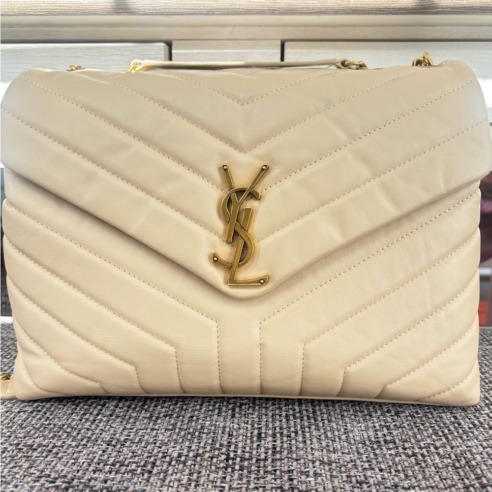 Saint Laurent Crossbody Bag in Matt Gold. Quilted leather detailing.